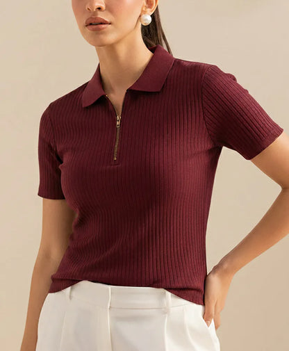 Fitted maroon ribbed knit polo top with quarter-zip placket and collared neckline