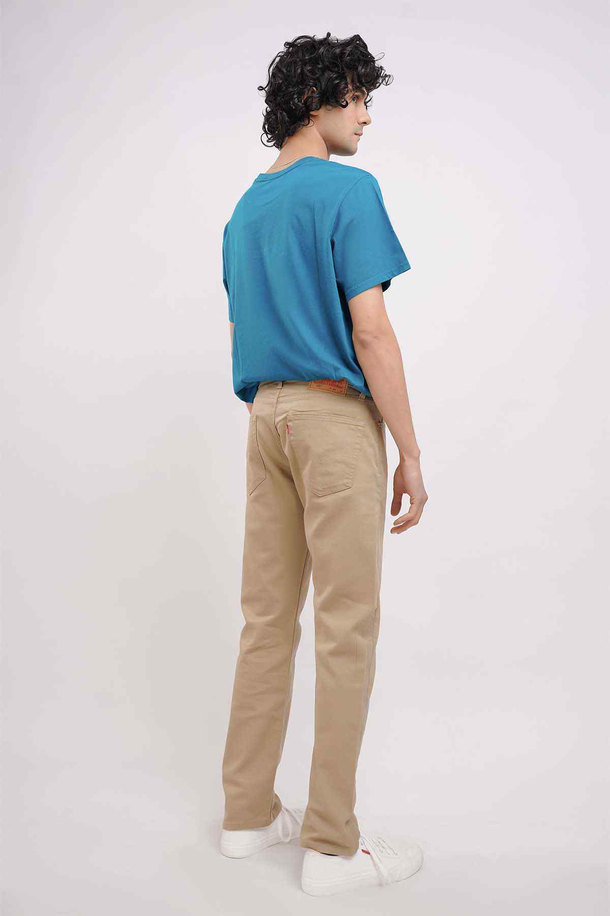 Khaki straight-leg pants from the back with belt loops