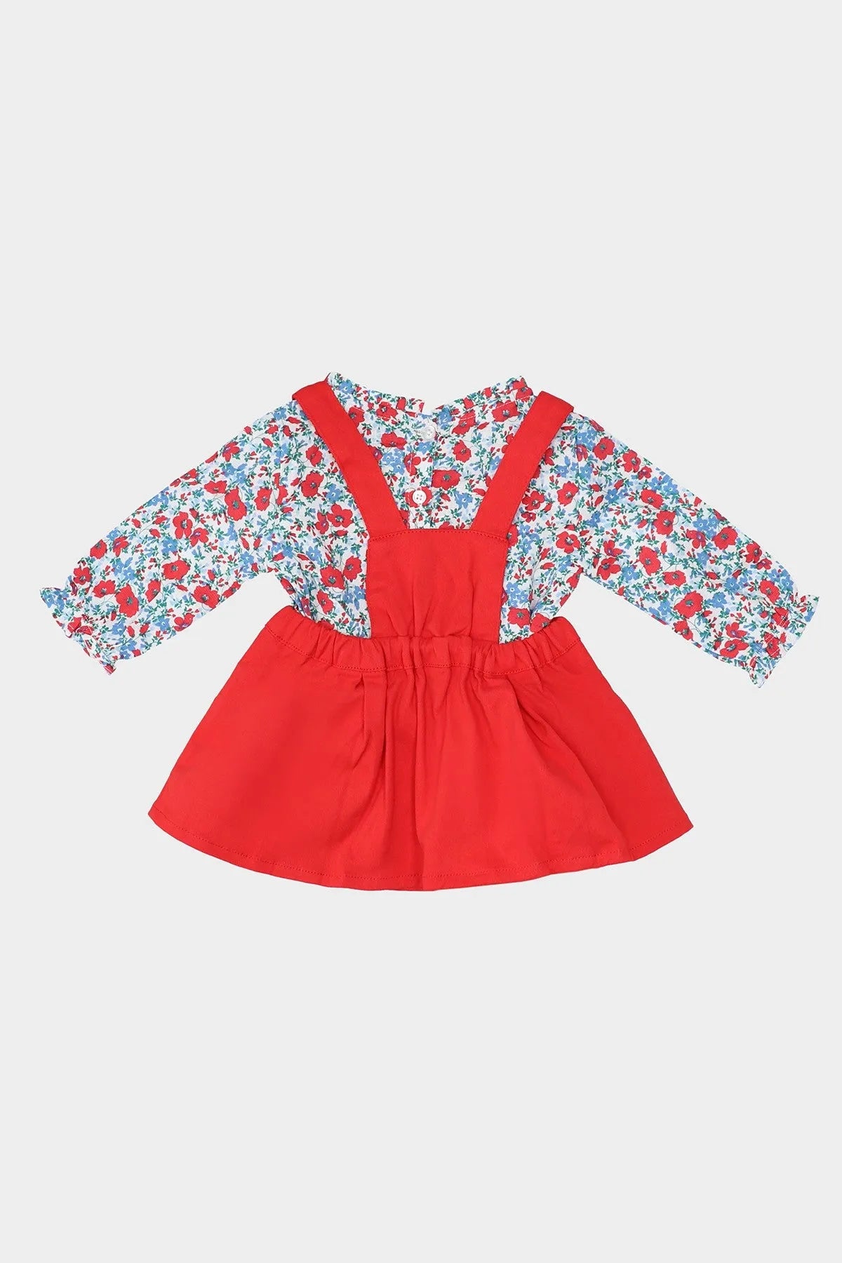 Red pinafore dress with floral long sleeves and pleated skirt