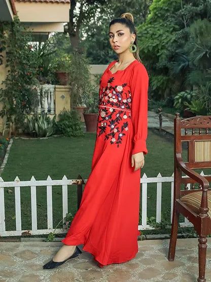 Red V-neck maxi dress with black-and-red floral embroidery and long flared sleeves