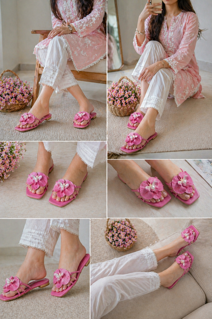 Dark pink flower-buckled slide sandals, flat open-toe style with pearl bead center
