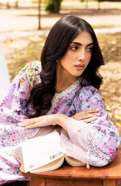 Lilac floral dress close-up with lace-trim neckline and long puffed sleeves