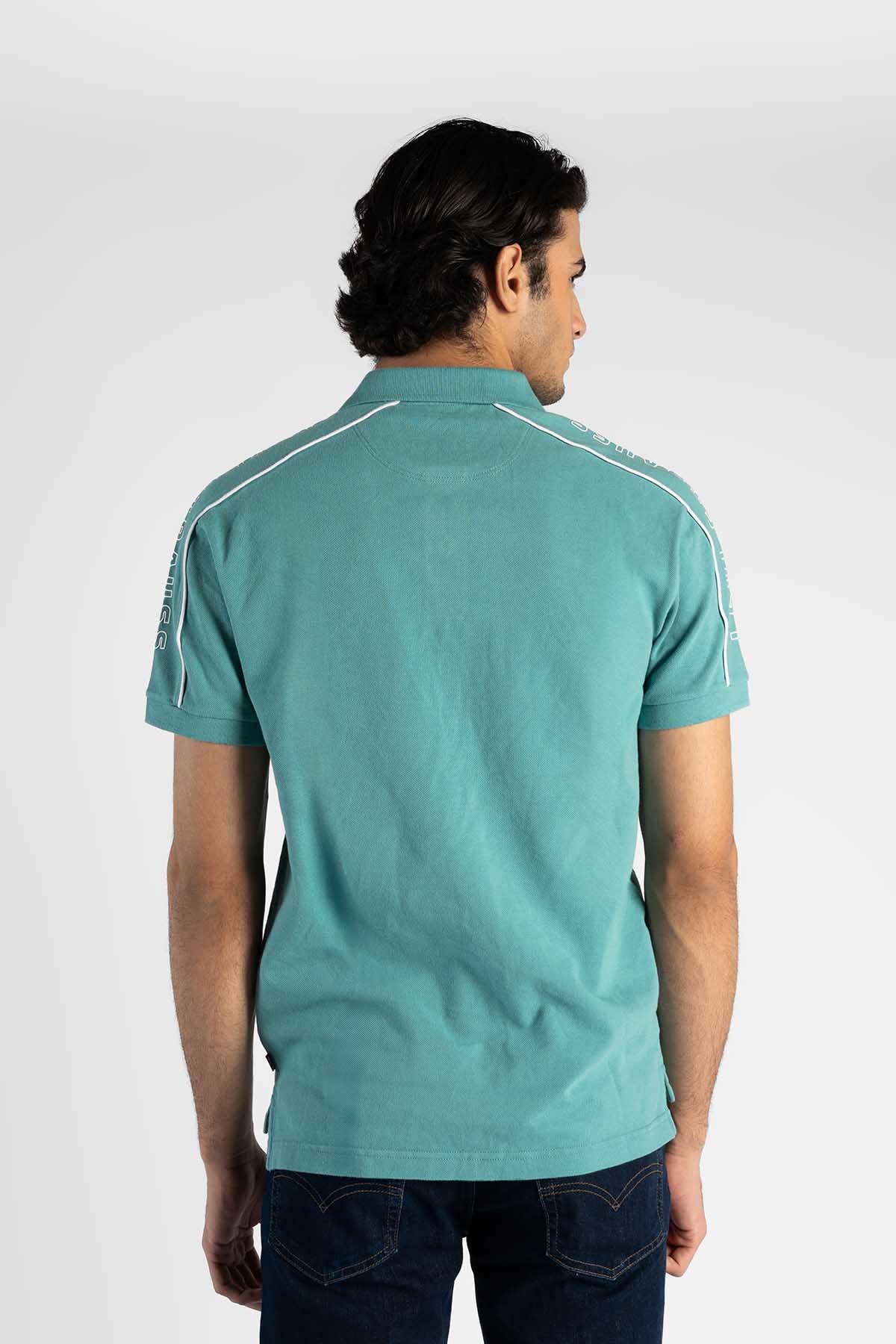 Levi's teal polo shirt back view with striped shoulder panels