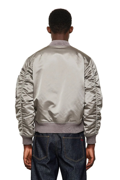 Grey bomber jacket back view, ruched sleeves, ribbed hem