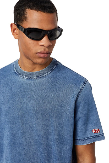 Diesel light blue denim T-shirt close-up, crew neck and side logo patch