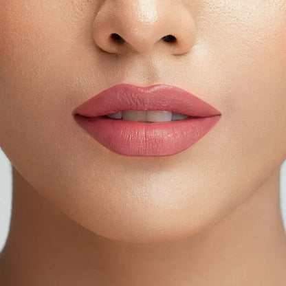 Conatural velvet lipstick on lips, dusty rose pink lip color