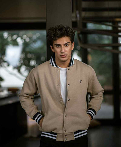 Men's tan fitted bomber jacket, snap-front closure with ribbed striped collar and cuffs