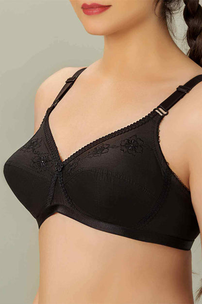 Black balconette bra with lace-trimmed V neckline and adjustable straps