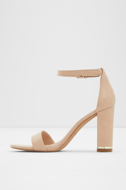 Bone heeled sandal with open toe, ankle strap, and square block heel