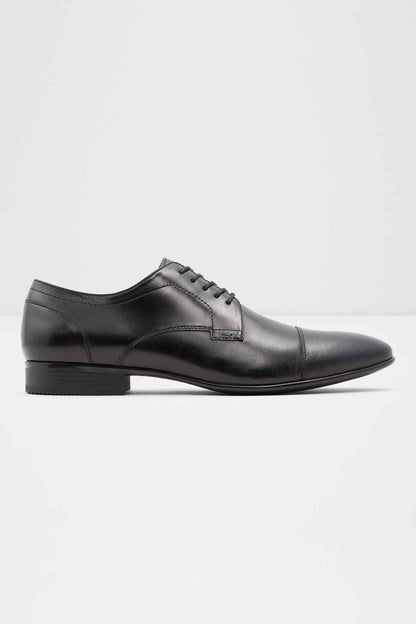 Black leather lace-up oxford dress shoe with straight toe and low stacked heel
