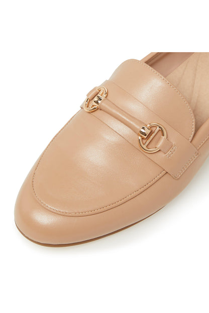 Close-up of camel leather loafer with gold-toned horsebit clasp detail