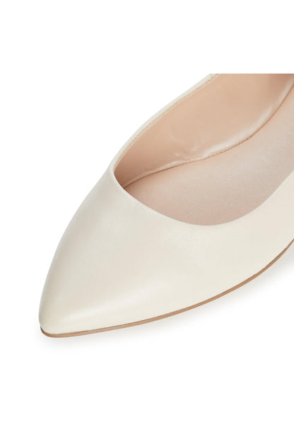 Ecru pointed-toe ballet flat, close-up of smooth toe and seam