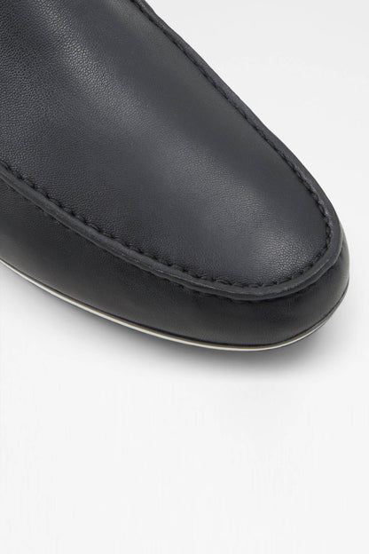 Black leather loafer vamp with stitched apron and dark outsole trim
