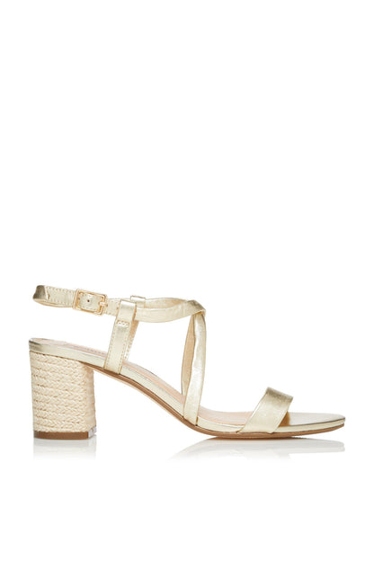 Gold strappy heeled sandals with ankle strap and buckle