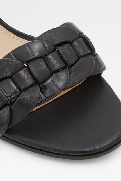 ALDO black woven strap heeled sandal close-up with ankle strap and block sole