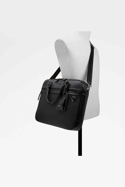 ALDO black handbag worn on shoulder with crossbody strap and front hardware