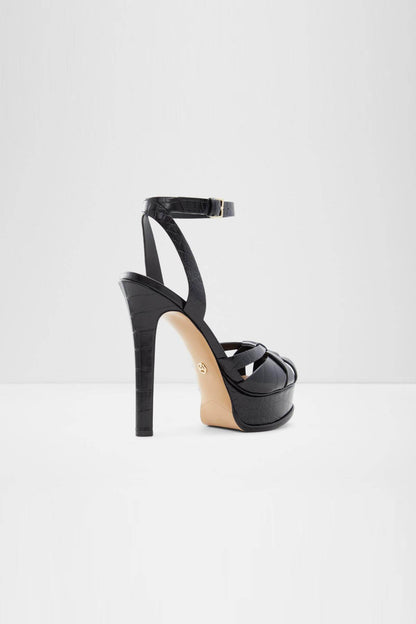 Black heeled platform sandal with ankle strap, open toe, and crisscross straps