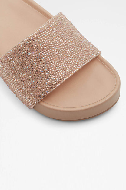 ALDO bone rhinestone slide sandal strap detail on tan footbed