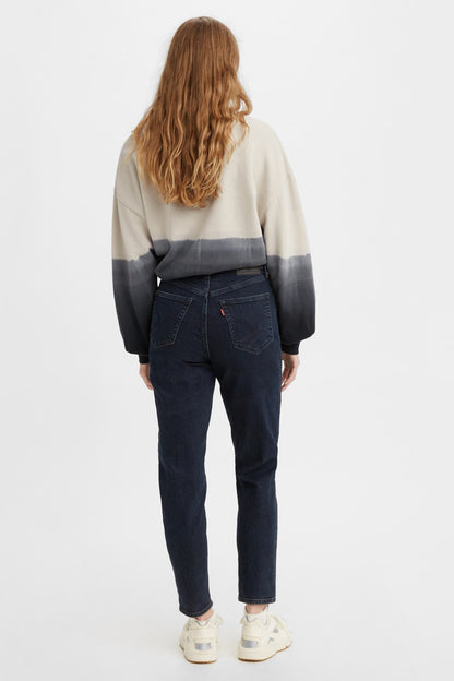 Dark blue denim jeans with straight legs, back view