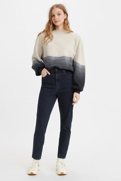 Dark blue denim jeans with straight legs, full-body front view