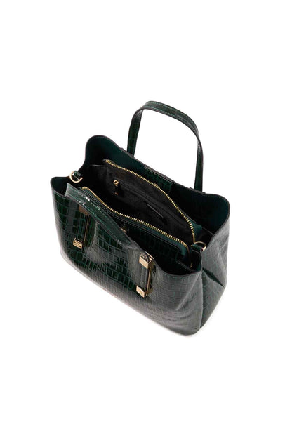 Dark green croc-embossed handbag open to show inner lining and top zip