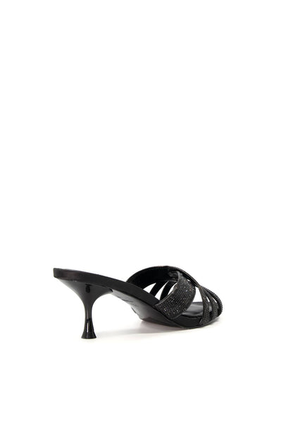 Dune London black mule sandal with crisscross straps and slender stiletto heel