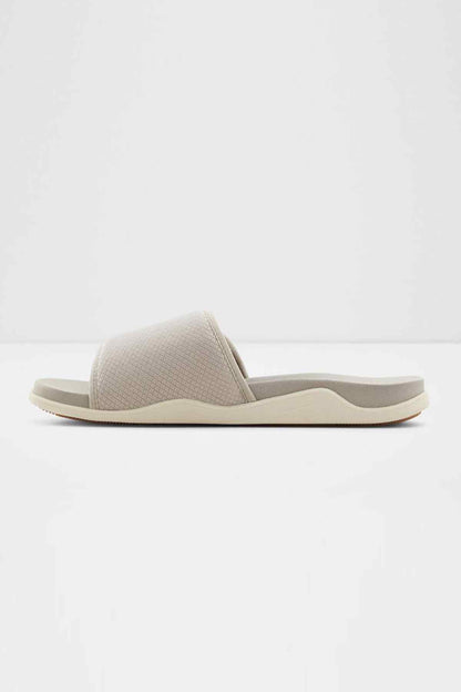 ALDO slide sandal in light beige fabric with wide strap and contoured sole