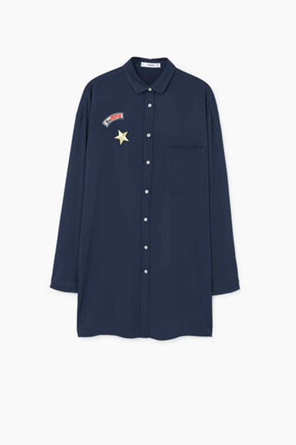 Navy long-sleeve button-up shirt with chest star and badge detail