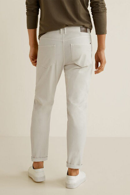 Light grey denim jeans with cuffed hem and side pockets