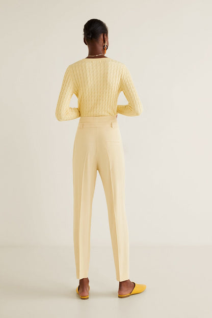 Back view: high-waist vanilla trousers with tie belt