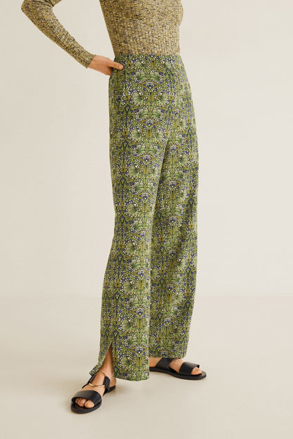 Green patterned long-sleeve jumpsuit with button front and wide-leg pants