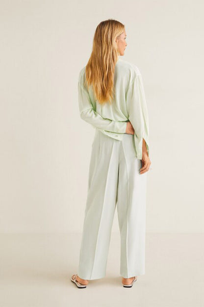 Light green button-front shirt and wide-leg trousers set, side view