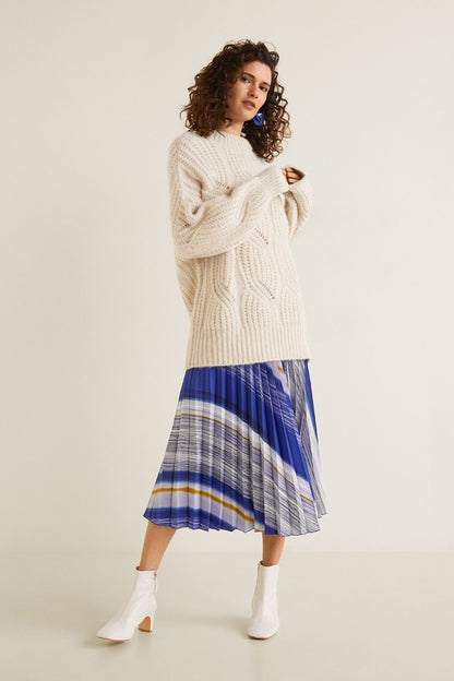Cream cable-knit sweater and blue striped pleated midi skirt outfit