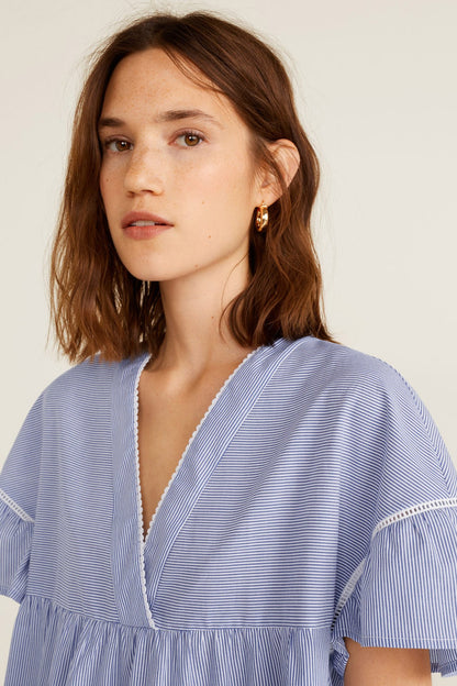 Light blue striped V-neck dress with ruffled trim and gathered neckline