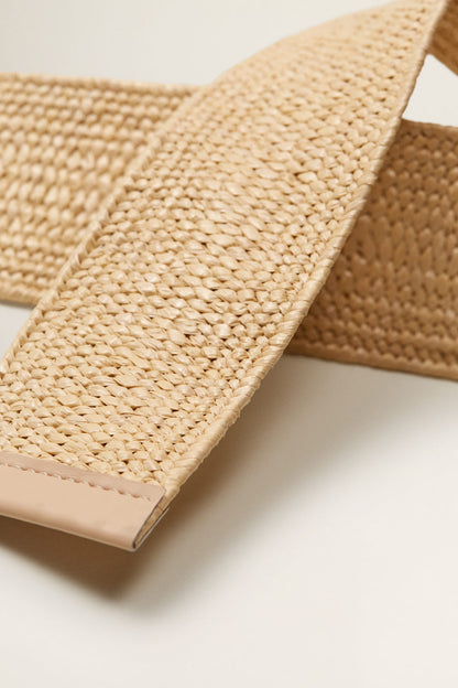 Sand woven belt strap end with stitched edge and light tan leather underside