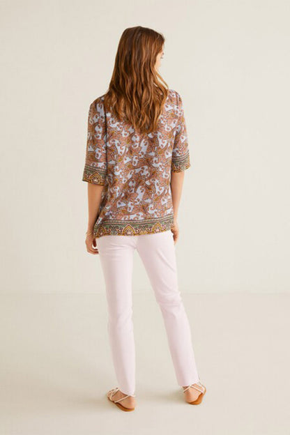 Pastel pink slim ankle pants with straight leg and cuffed hems