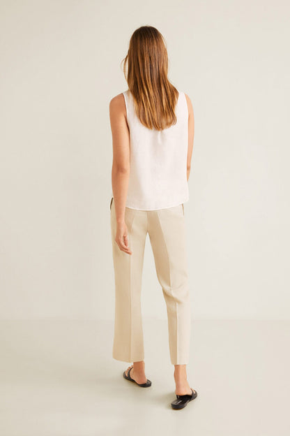 MANGO white sleeveless button-up shirt vest, back view with button placket