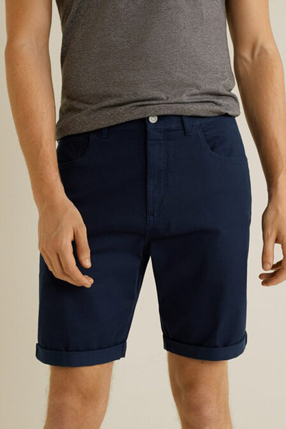 Navy chino shorts with front button closure and side pockets