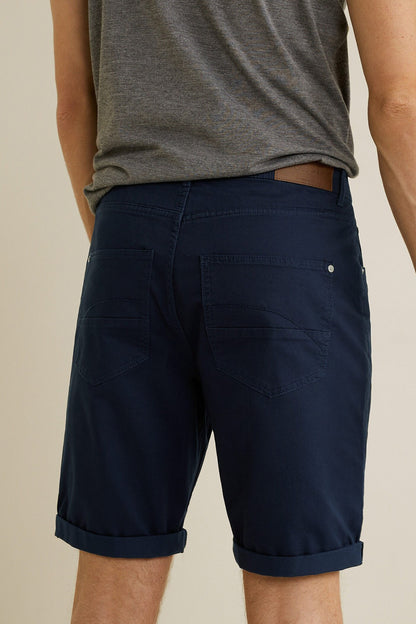 Navy chino shorts with belt loops and back pockets