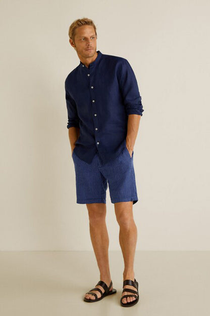 Navy striped drawstring shorts with front button placket and side pockets