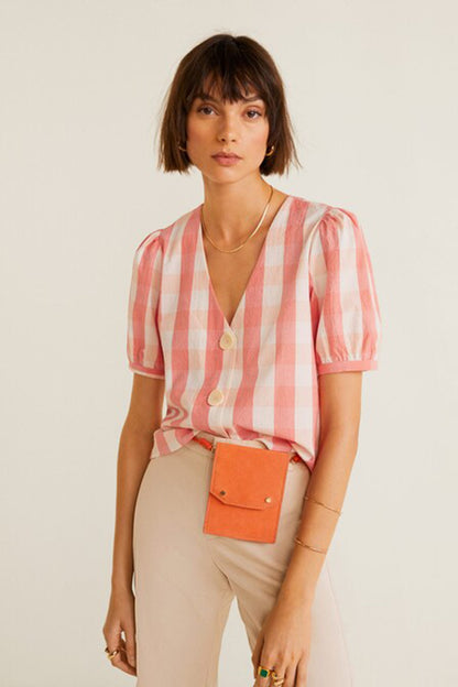 Coral red and white striped puff-sleeve blouse with V-neck and button placket
