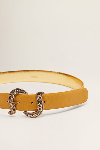 Mustard leather belt with ornate silver-tone buckle and logo on strap
