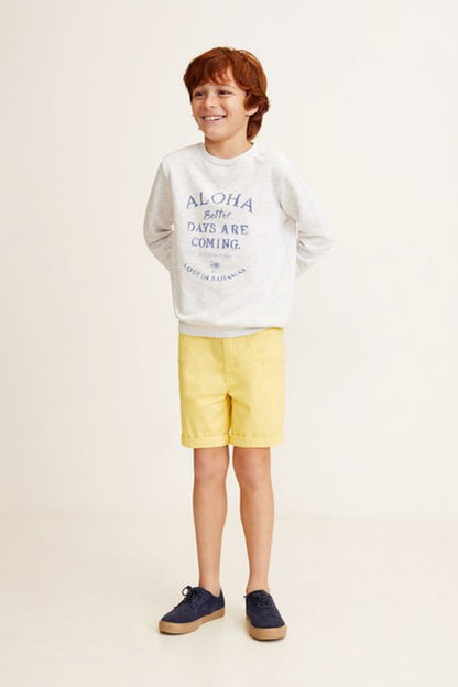 Kids light gray ALOHA sweatshirt with yellow shorts and navy sneakers