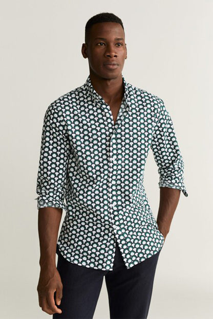 Mens patterned button-up shirt with teal and white circle print, roll-up sleeves