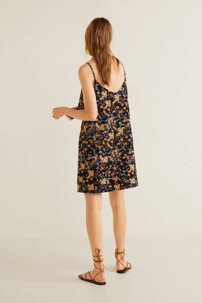 Black floral sleeveless dress with racer back and spaghetti straps, back view