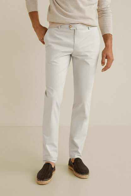 Light off-white slim chinos, button-and-zip fly, belt loops, front and back pockets