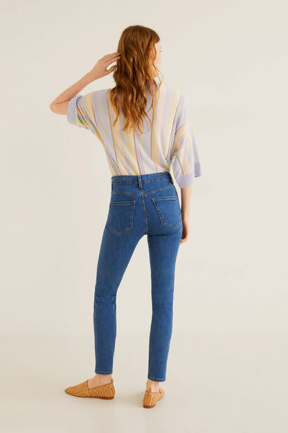 Medium-blue denim jeans, slim tapered fit, back view with belt loops and back pockets