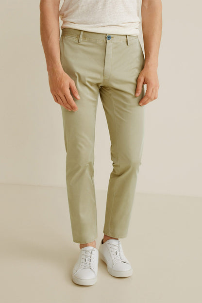 Beige chino pants with straight legs, button closure, and front pockets