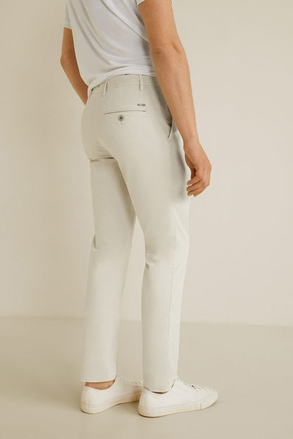 Light grey straight-leg jeans, visible back pocket and belt loops