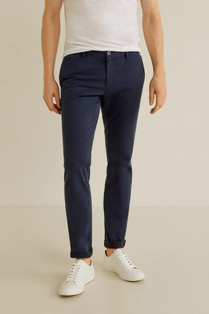 Navy slim-fit trousers with button fly and cuffed hems